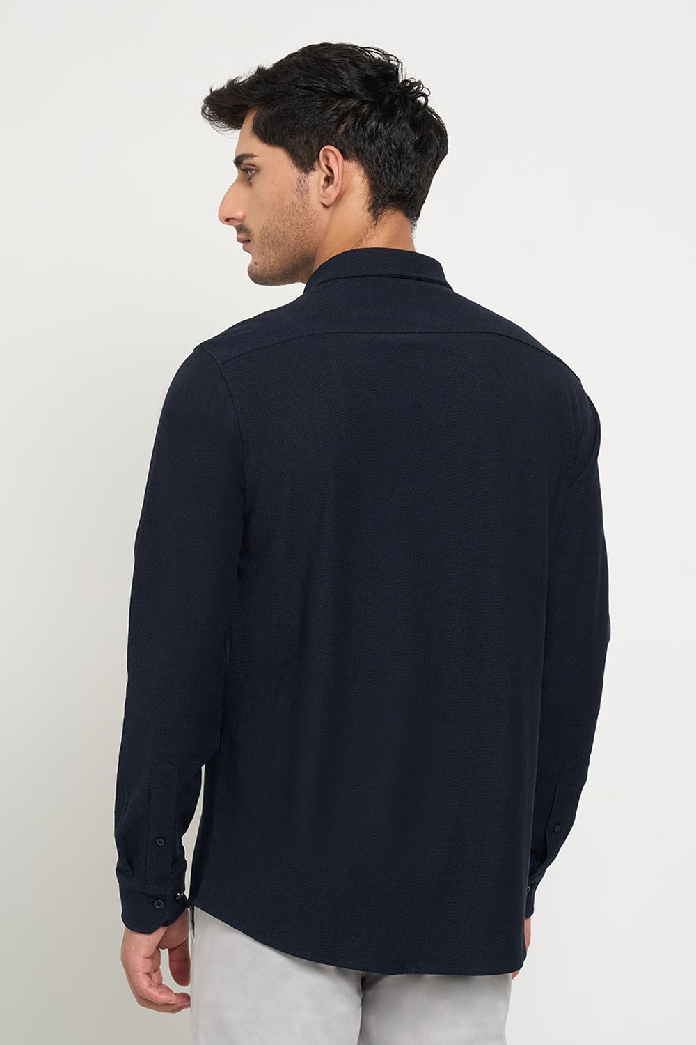 Shirt with buttoned cuffs