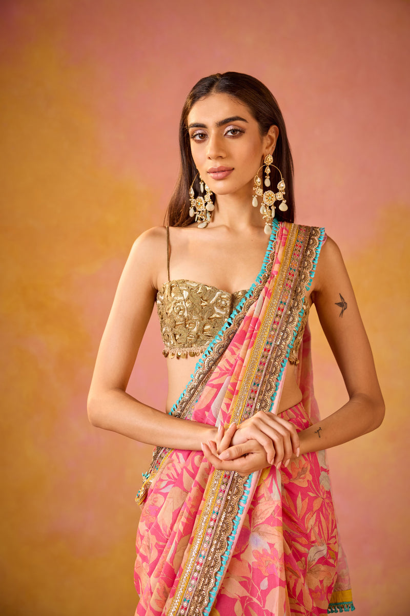 Pink Muslin Saree With Gold Embroidered Blouse