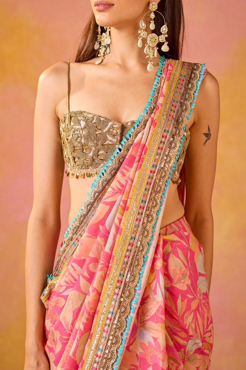 Pink Muslin Saree With Gold Embroidered Blouse