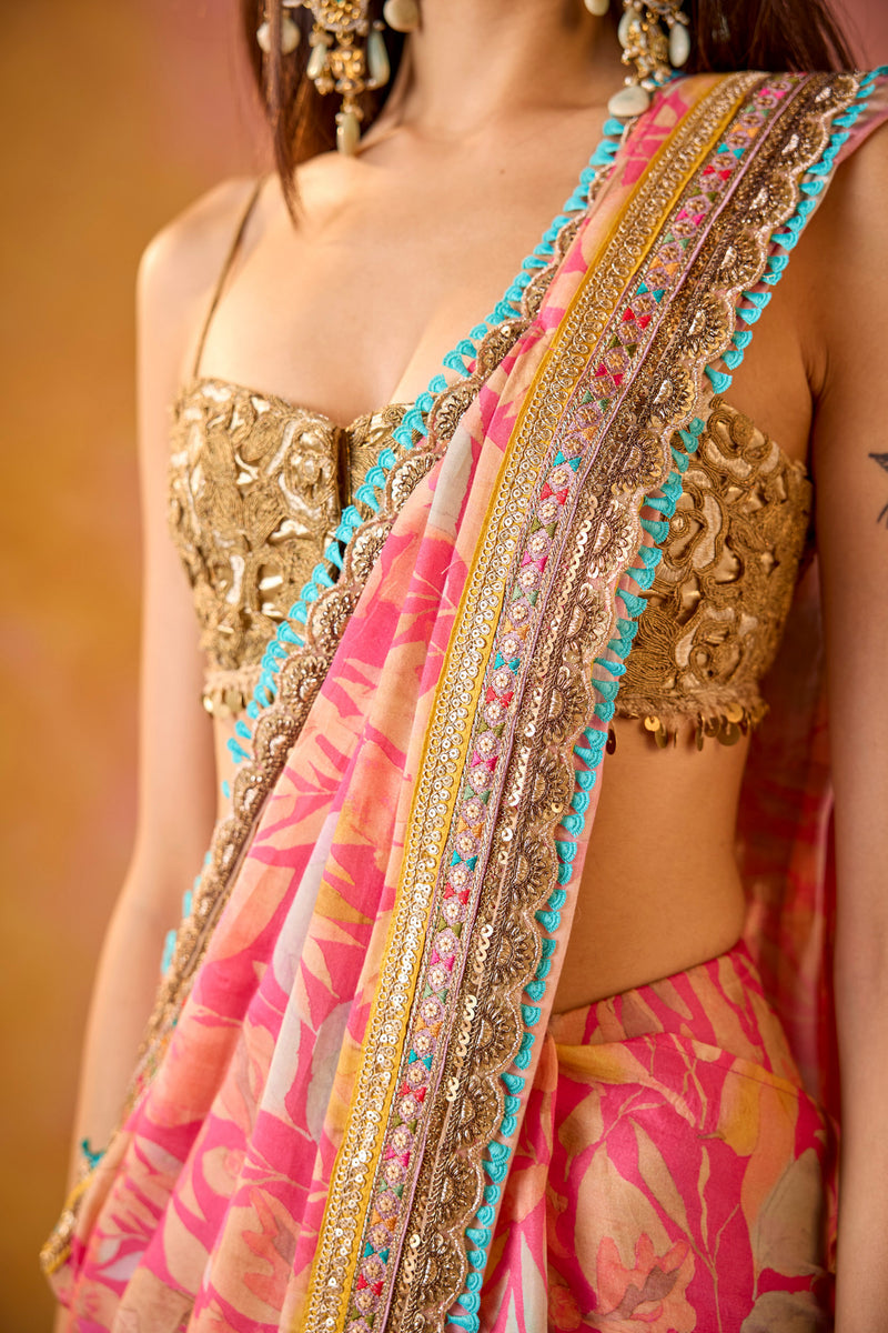 Pink Muslin Saree With Gold Embroidered Blouse