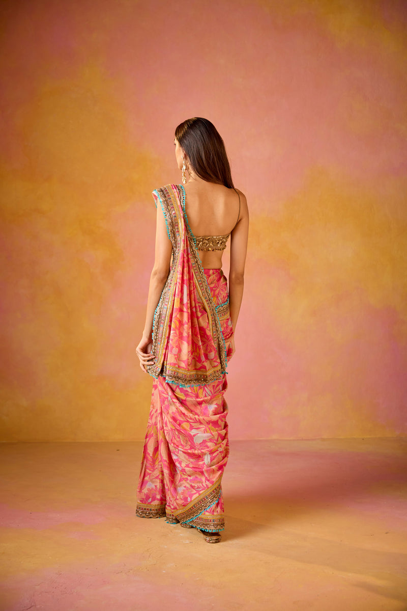 Pink Muslin Saree With Gold Embroidered Blouse
