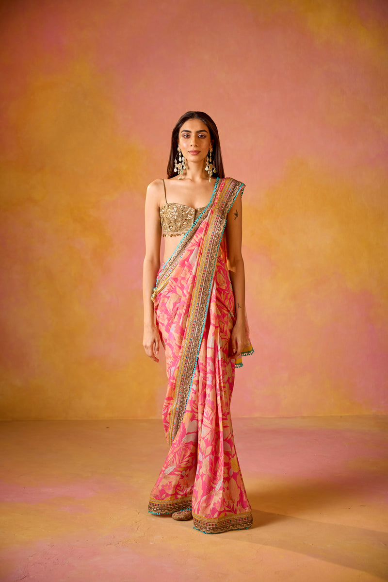 Pink Muslin Saree With Gold Embroidered Blouse