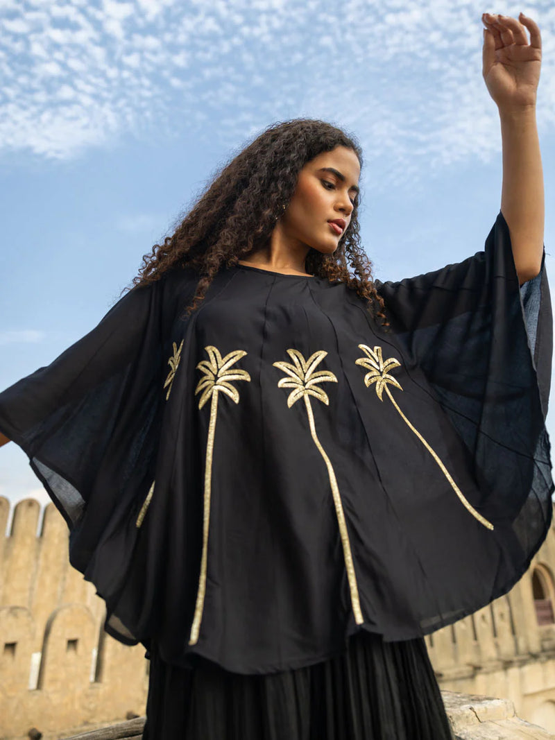 hand-sequined black ensemble