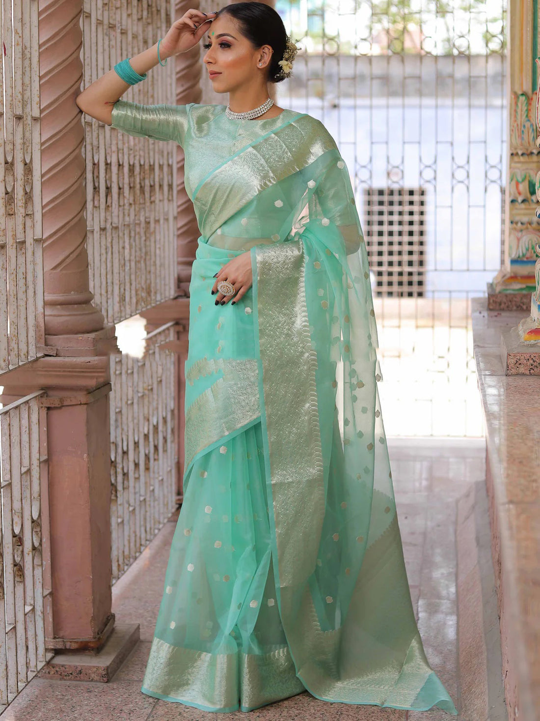 sea green organza saree with zari